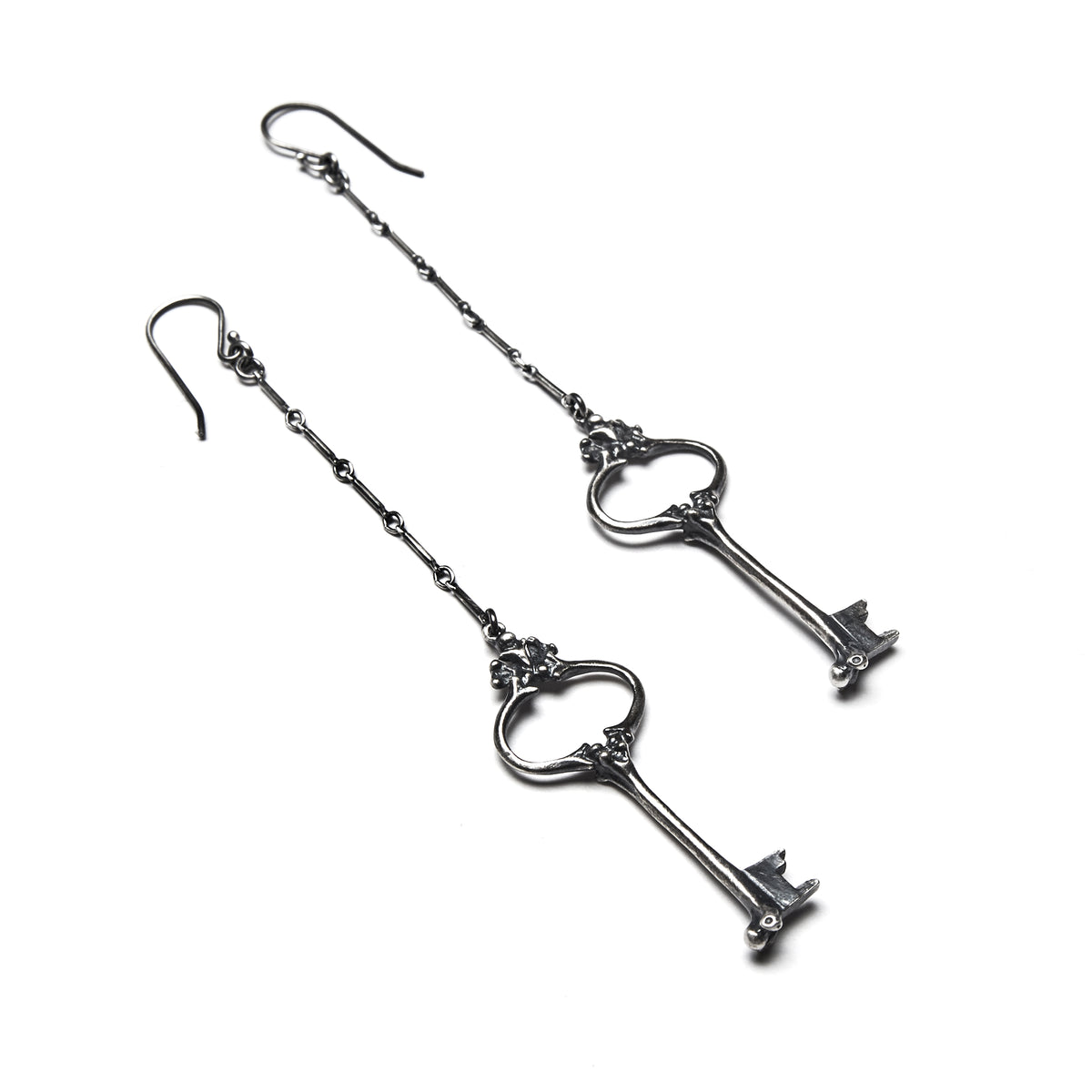 The Key of Solitude Earrings