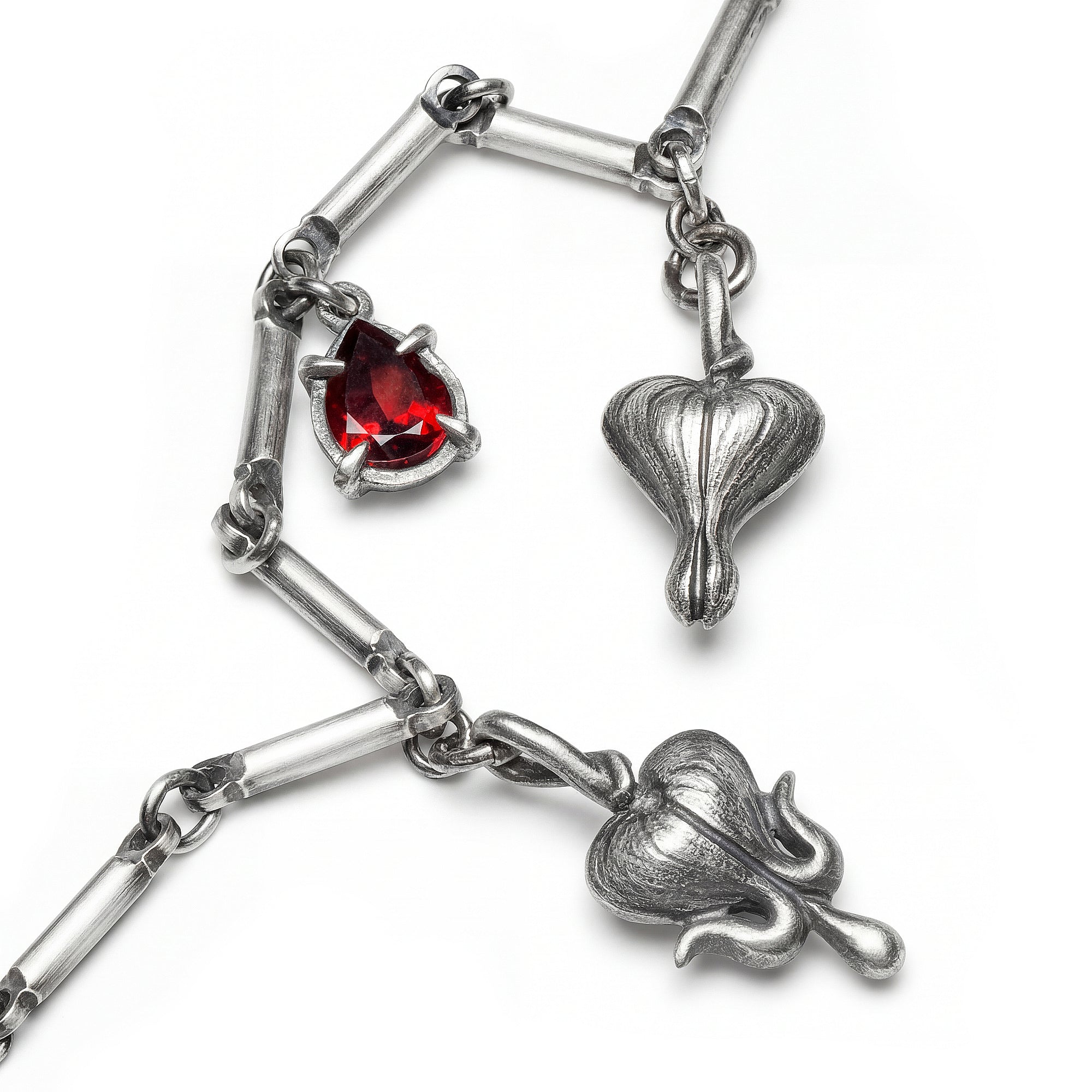 The Blood of Spring. Bleeding Hearts Garnet Charm Bracelet.