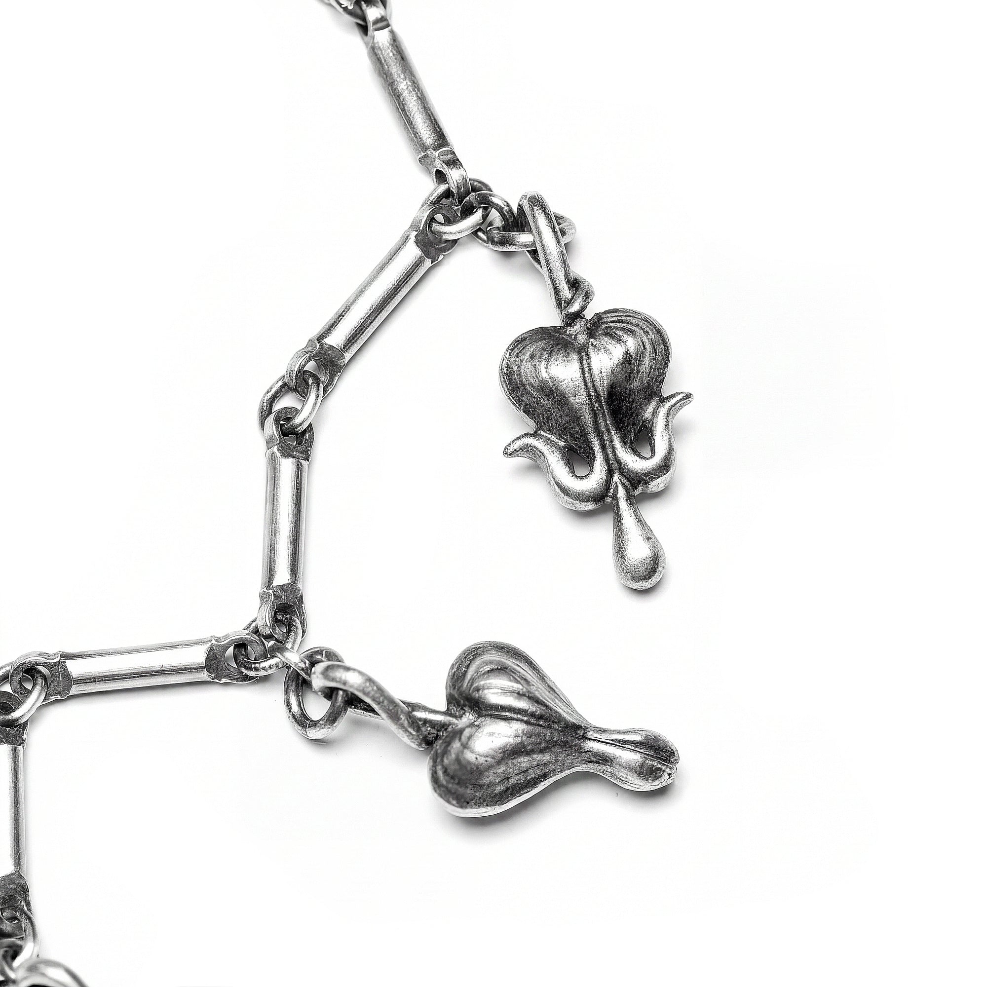 The Blood of Spring. Bleeding Hearts Charm Bracelet.