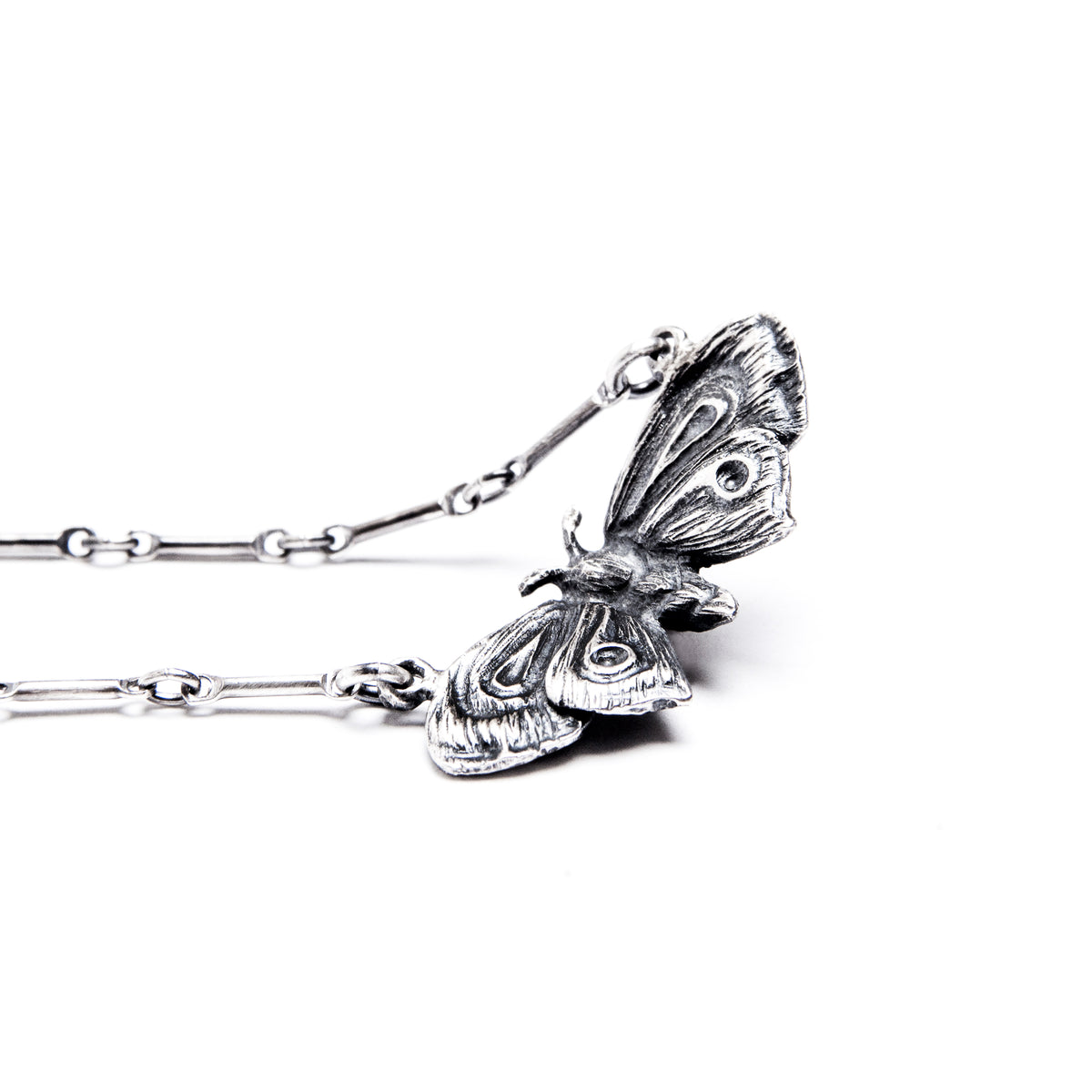 Alice Planchette Moth Necklace.