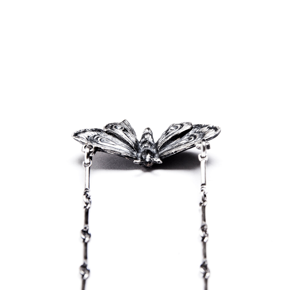 Alice Planchette Moth Necklace.
